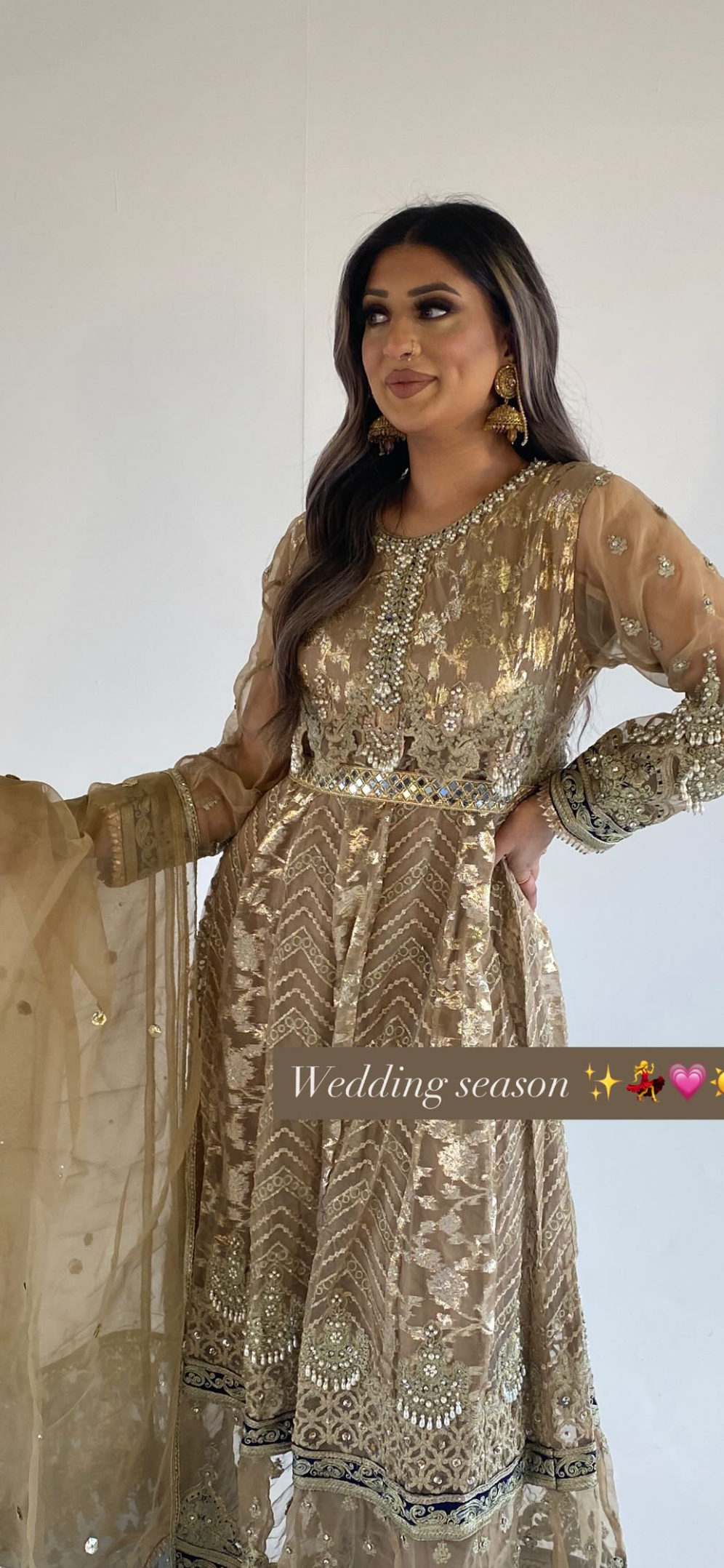 AREEBA gold and navy blue outfit