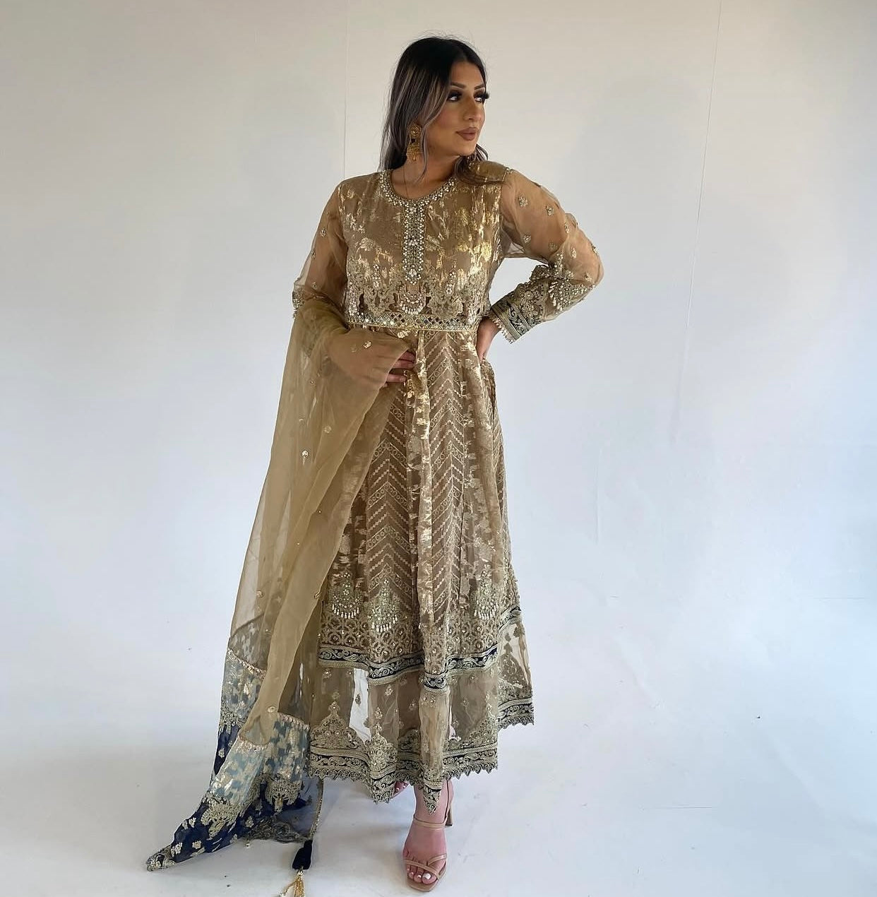 AREEBA gold and navy blue outfit
