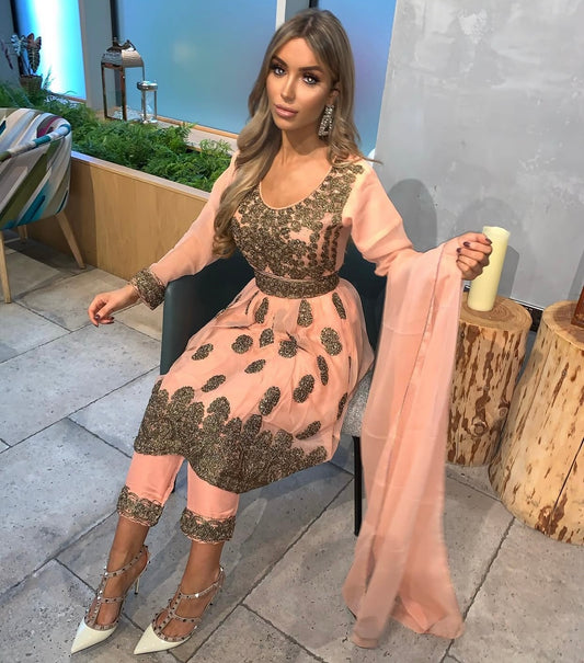 EIRA pink and gold outfit